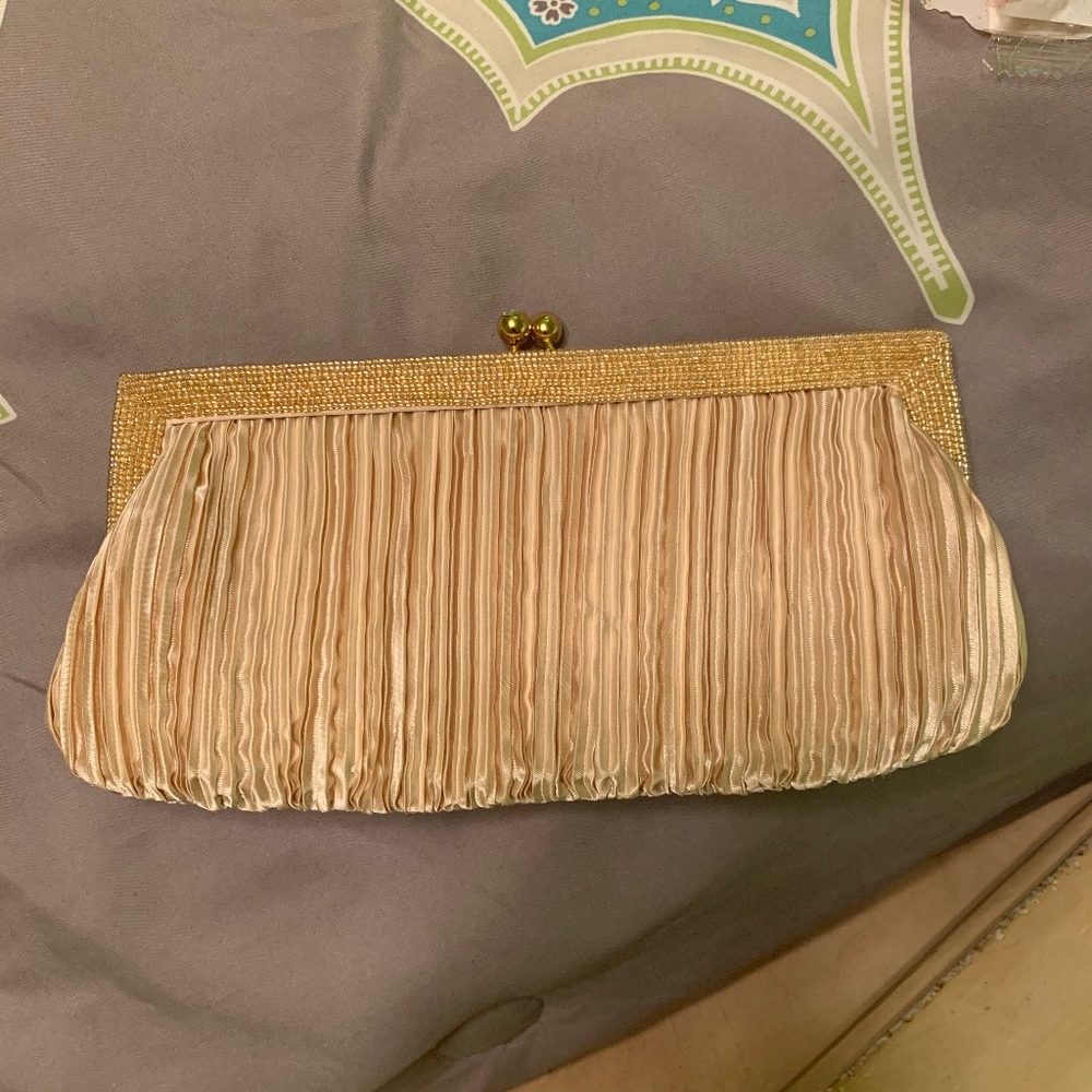 Gold clutch bag